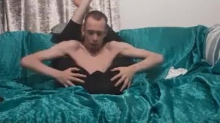 Skinny baldy teen wears leggings and puts his legs behind hi head and fingers his ass