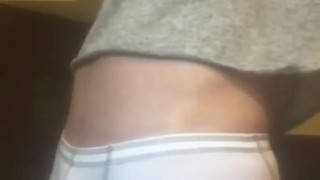 Gay twink showing and grabbing big bulge in white boxer briefs 