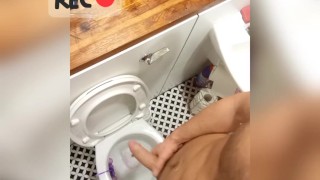 Guy masturbate and pisses in toilet then orgasms and cums everywhere!