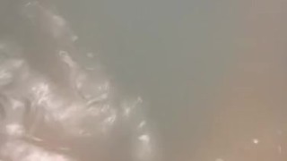 playing with my legs during bath time 