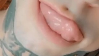 Horny tattooed guy licking his lips