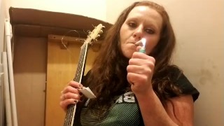 Getting ready to play my guitar while smoking