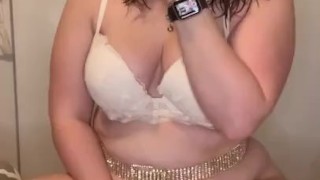 Strip tease playing with pussy