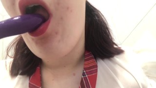 School girl sucks vibrator clean