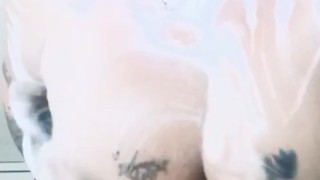 Soaping up my tits
