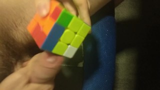 Man solves Rubik's Cube with penis