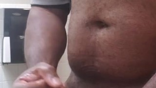 Jacking off at work in the rest room