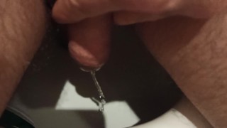 Pissing in the toilet. 