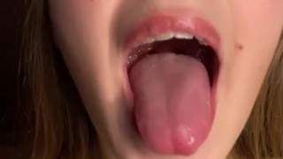 Swallowing gummy bears with open mouth