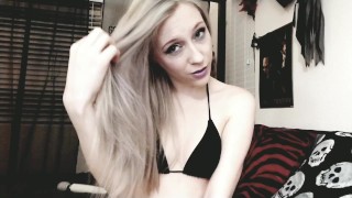 cute blonde camgirl brushes her long silvery hair