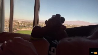Stroking big dick with a view