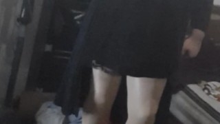 Crossdresser wearing heels and pantyhose