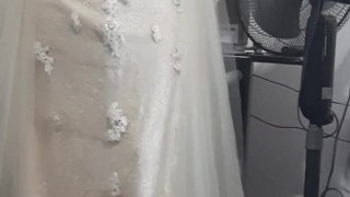Crossdresser wearing bridal dress