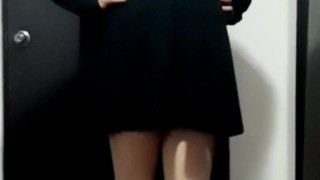 Cute crossdresser wearing dress and heels 
