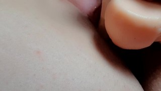 Teen girls plays with her toy dildo.