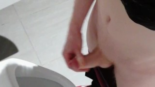 Taking a break at university to jerk off and cum at the public bathrooms