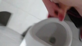 Taking a break at university to jerk off and cum at the public bathrooms