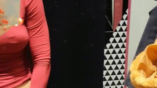 Store fitting room and sexy babe