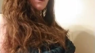 Sexy red head smoking and playing with titties 