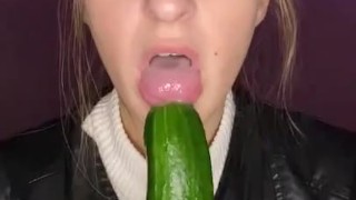 Cucumber sucking. Leather jacket 