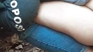 Wife peeing in woods