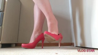 standing shoeplay in heels