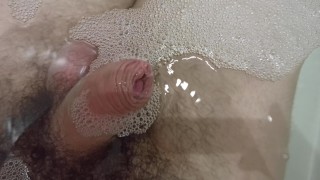 Enjoy pissing inside water with foam. Uncut Close-up cock