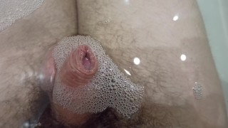 Enjoy pissing inside water with foam. Uncut Close-up cock