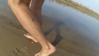 Walking naked on the beach