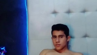 sexy twink jerking off his big uncut latino cock and cumming
