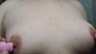 Playing with my boobs and using vibes on them