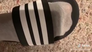 Cute teen feet in sports sandals