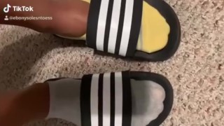 Cute teen feet in sports sandals