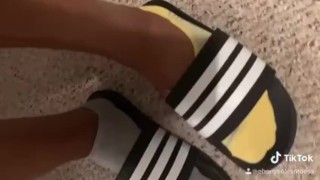 Cute teen feet in sports sandals