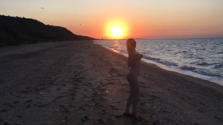 naked booty milf swimming in the sea sunset