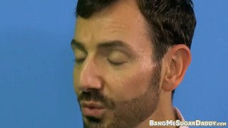 Sexy twink gets on his knees to suck some older raw cock