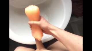 I get a blowjob from my fleshlight and cum inside it