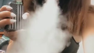 Vaping in bra and leggings