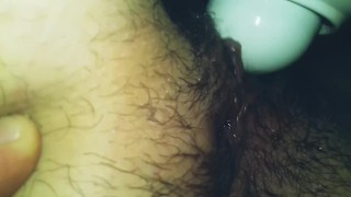 Hairy milf masturbates with neck massager