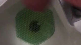 Peeing at a public urinal, was about to Jerk off but another guy walked in, I had to stop recording.