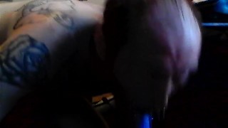 tattooed bi male, practicing how to give a blow job.