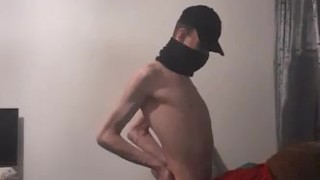 Very skinny teen with a mask and long socks fucks his beloved teddy bear on his bed