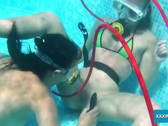 Underwater Lesbians Lick and Suck Dildos 