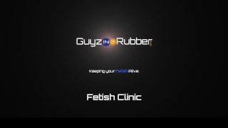 Guyzin2Rubber Fetish Clinic sees Dr Bennett man-handling his Patient's huge cock.Both in hot Rubber