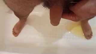 Nice yellow urine is pouring in the bathroom.