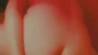 Masturbating