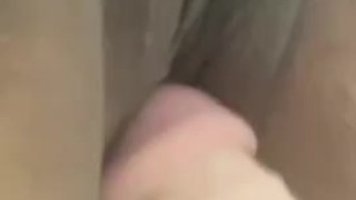Pauline playing with her dildo under the water
