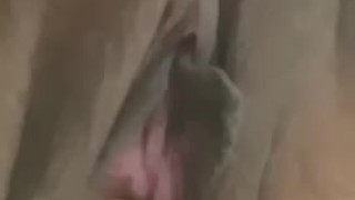 Pauline playing with her dildo under the water