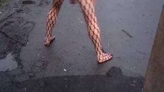 Fishnet bodysuit ball weights in street