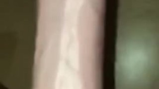 Ridning a gigantic dildo 